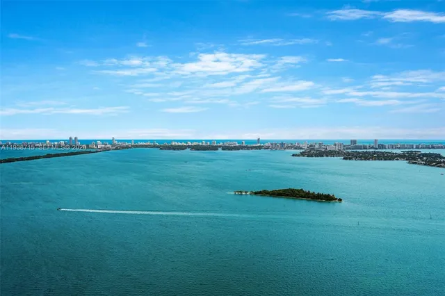 a view of a lake with a big yard