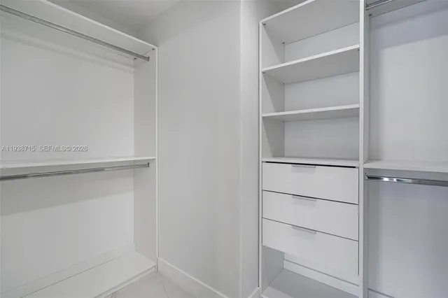 a view of an empty walk in closet