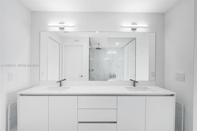 a view of a terrace with lawn chairs