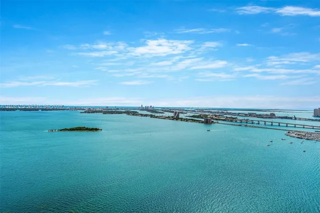 a view of a city with an ocean