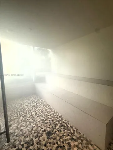 a view of swimming pool with outdoor seating