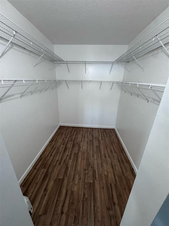 14024 Southwest 132nd Avenue Miami, FL 33186 - Photo 16 of 24 a view of a room with racks on the wall