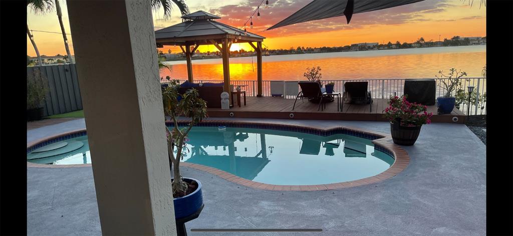 14024 Southwest 132nd Avenue Miami, FL 33186 - Photo 3 of 24 a view of living room with furniture and window
