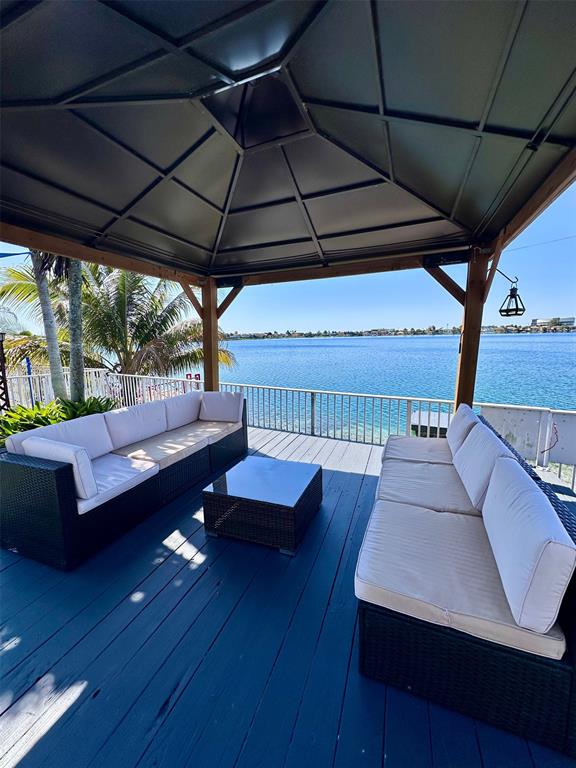 14024 Southwest 132nd Avenue Miami, FL 33186 - Photo 5 of 24 a living room with furniture and a wooden floor