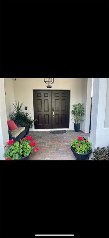 14024 Southwest 132nd Avenue Miami, FL 33186 - Photo 7 of 24 a view of a back yard of the house