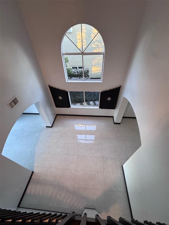 14024 Southwest 132nd Avenue Miami, FL 33186 - Photo 10 of 24 an empty room with windows