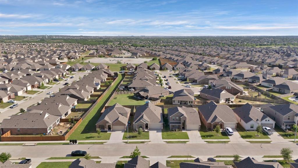621 Ridgeback Trail Fort Worth, TX 76052 - Photo 20 of 22 Expansive residential community featuring a variety of single-family homes with pitched roofs, individual driveways, and fenced backyards