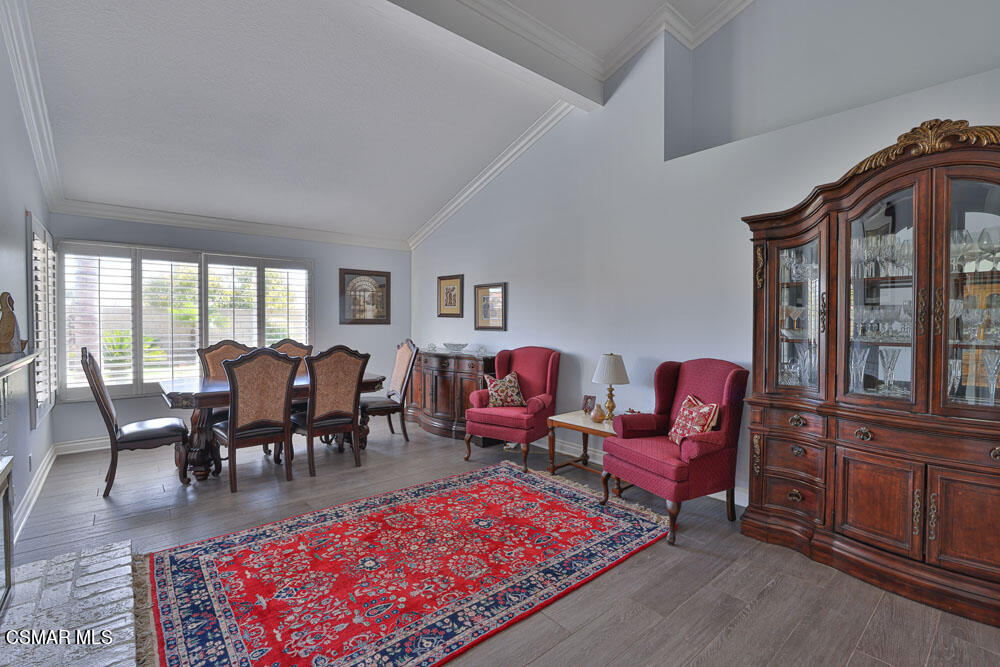 3920 Southhampton Road Moorpark, CA 93021 - Photo 4 of 41 a living room with furniture dining area and a rug