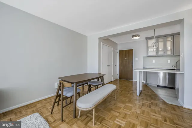 a room with furniture and a rug