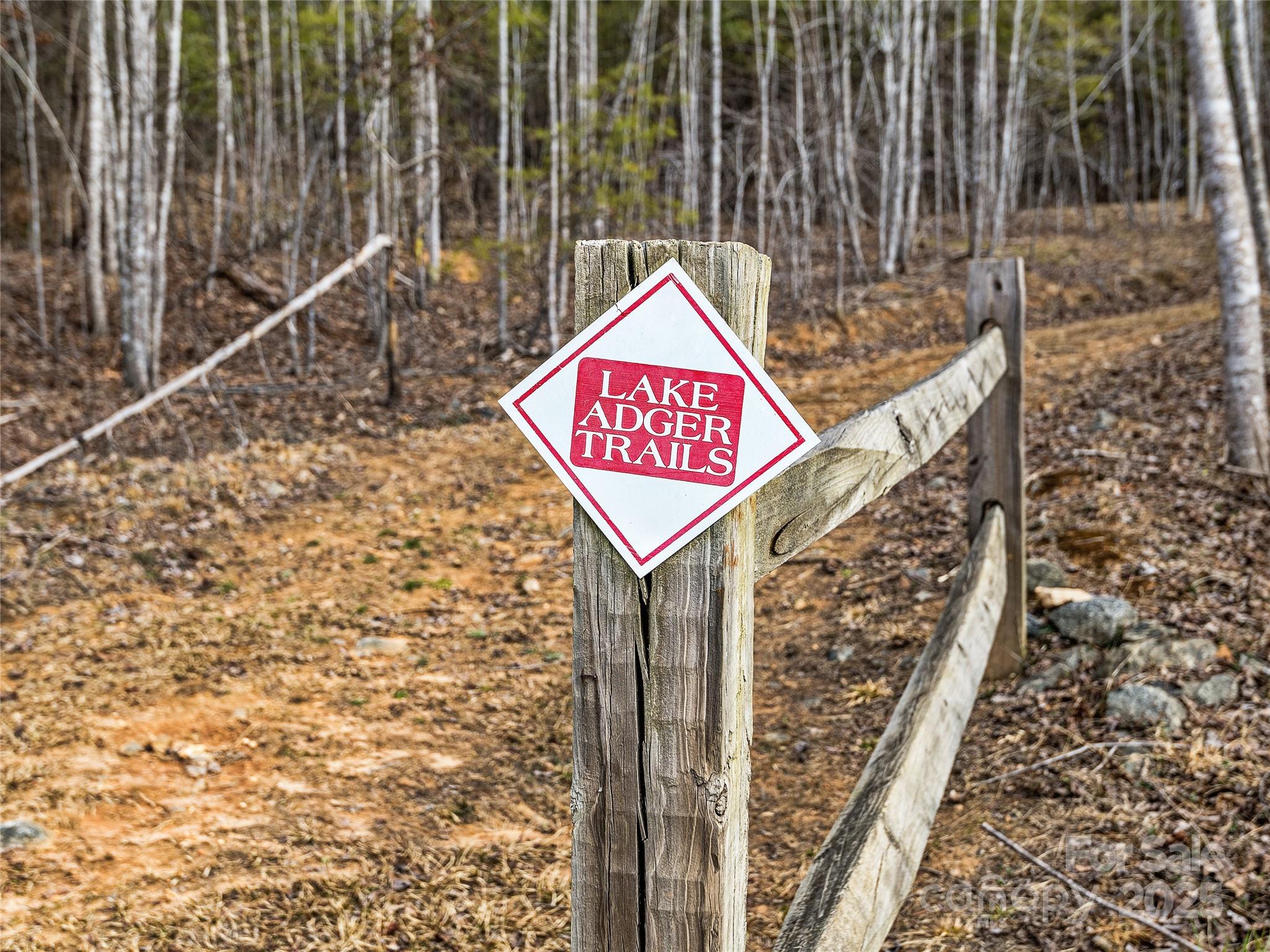 Lot #28 Parkway North Rd Mill Spring, Unit 28 Mill Spring, NC 28756 - Photo 21 of 23 a sign board with parking area