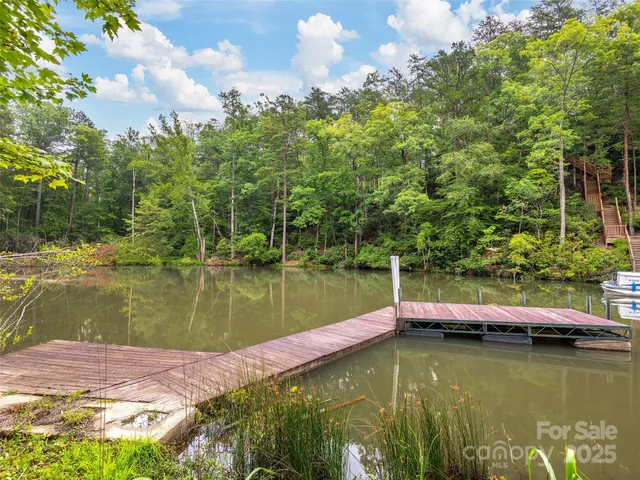 a view of swimming pool with a yard