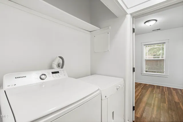 a utility room with dryer and washer