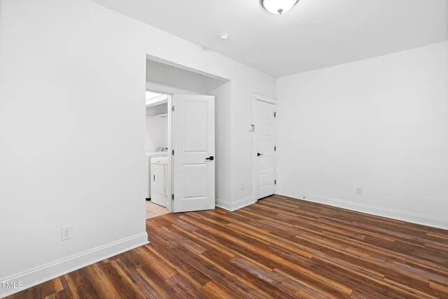 a bathroom with a sink a mirror and a toilet