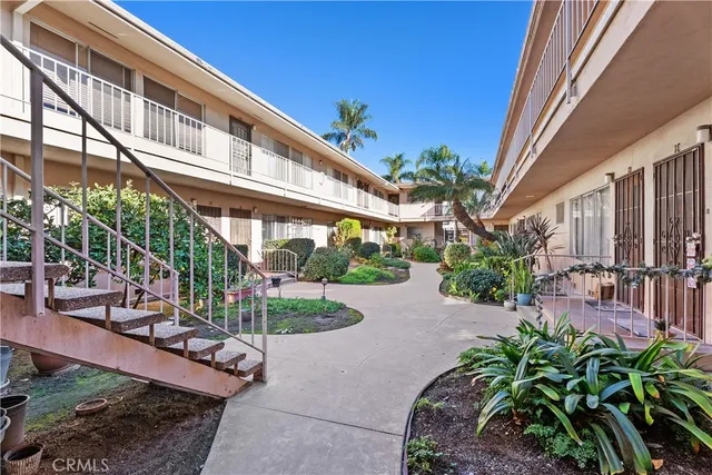 a view of a building with a yard