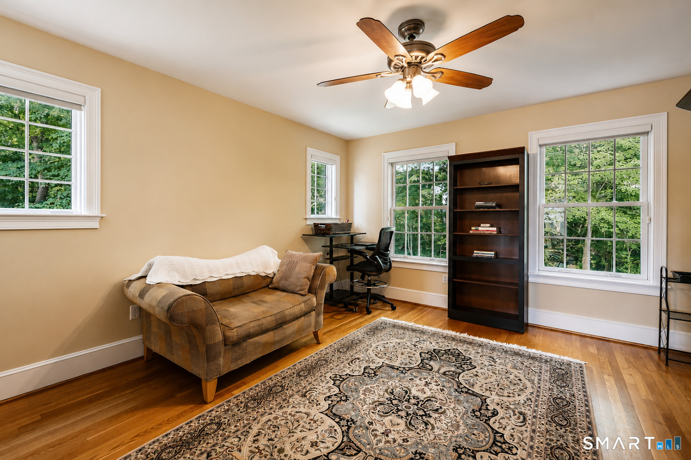 35 Anderson Lane Durham, CT 06422 - Photo 12 of 25 Versatile formal dining room with hardwood floors and abundant natural light, currently used as a home office and sitting area while easily transitioning back to elegant dining.