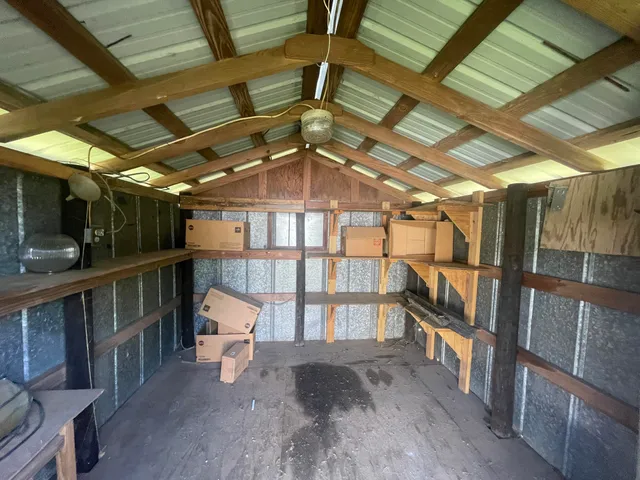 a view of a room with racks on the wall