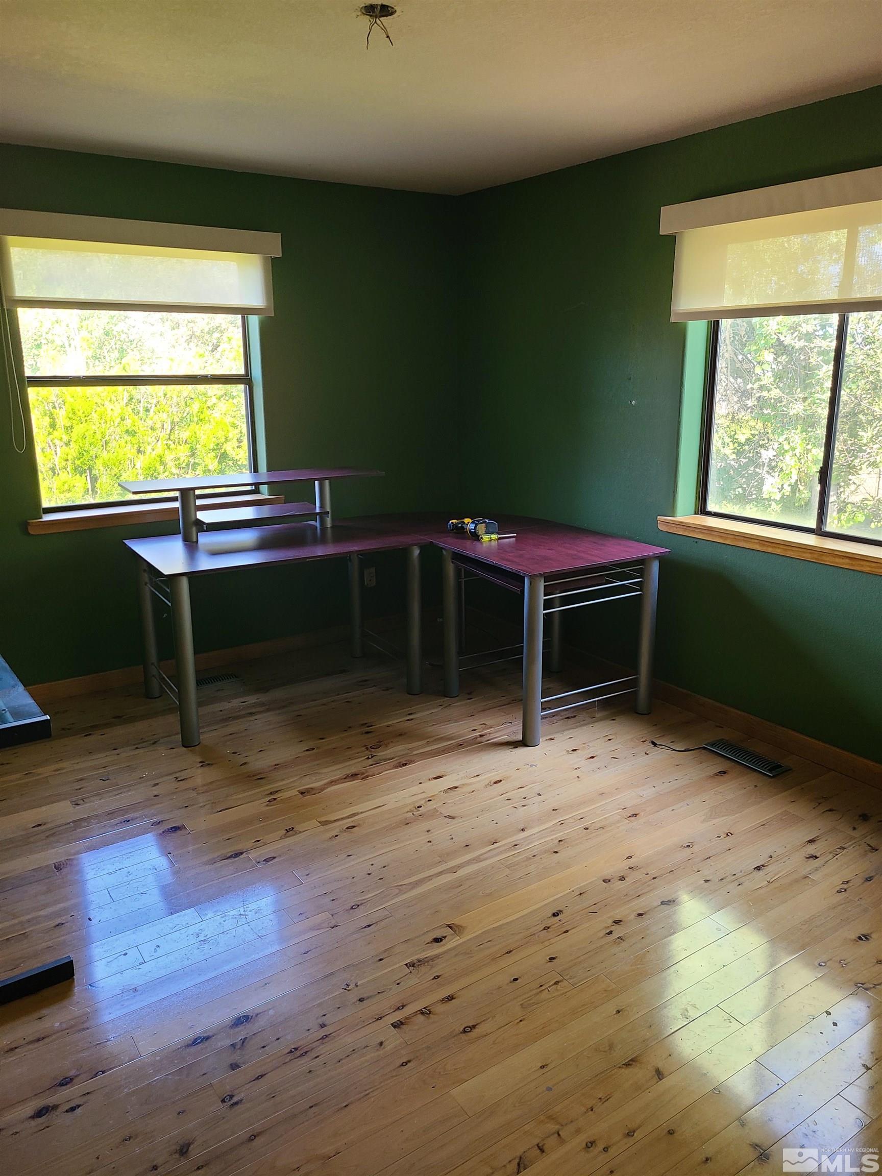 14460 Virginia Foothills Drive Reno, NV 89521 - Photo 11 of 17 a room with furniture and a window