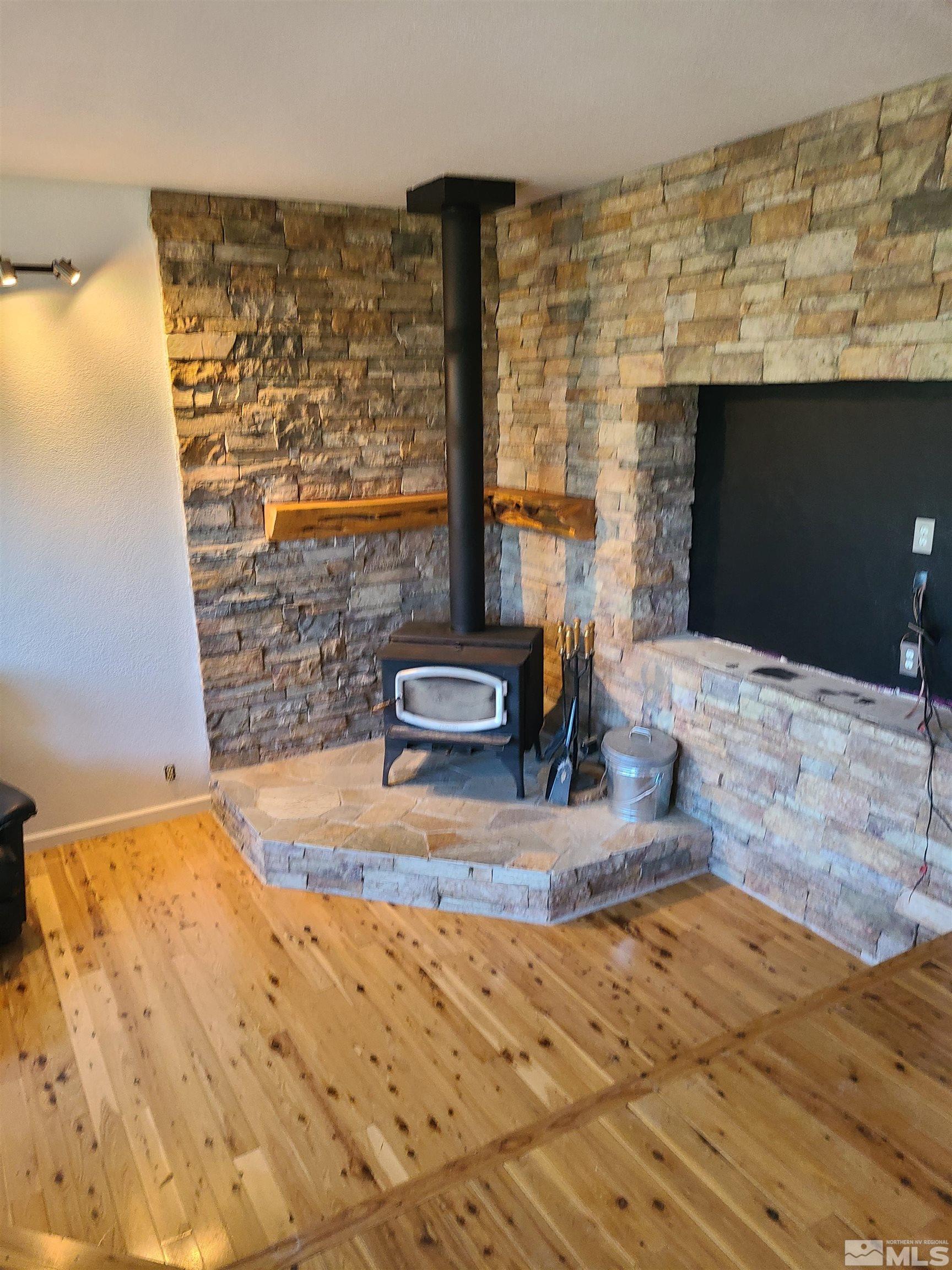 14460 Virginia Foothills Drive Reno, NV 89521 - Photo 7 of 17 a view of living room with furniture and flat screen tv