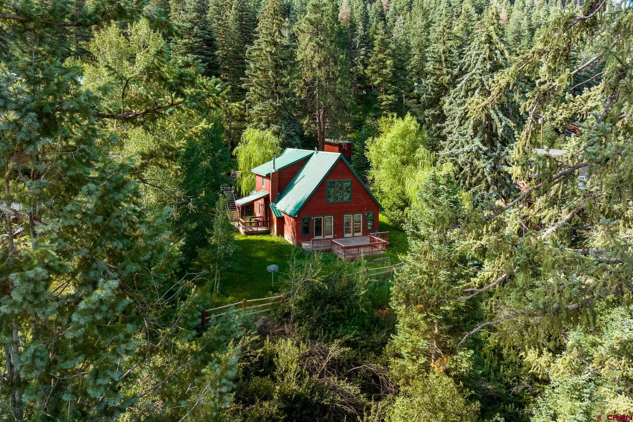 499 High Trails Drive Durango, CO 81301 - Photo 2 of 31 a view of house with a yard