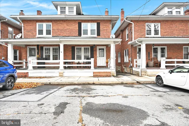 a view of a building with a street