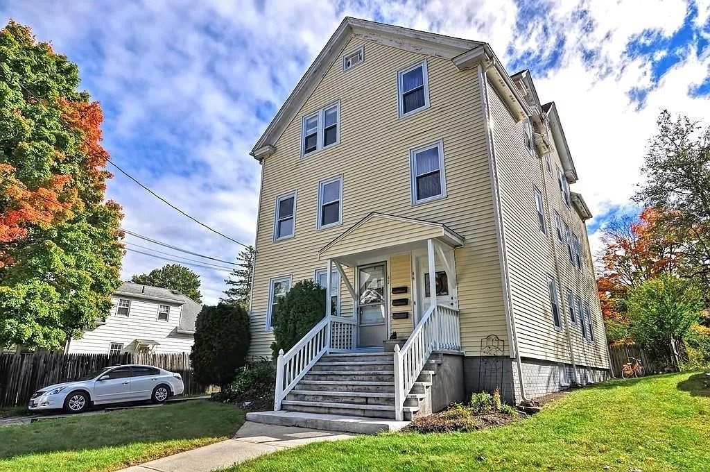 42 Pleasant Street, Unit C North Attleboro, MA 02760 - Photo 1 of 16 a front view of a house with garden