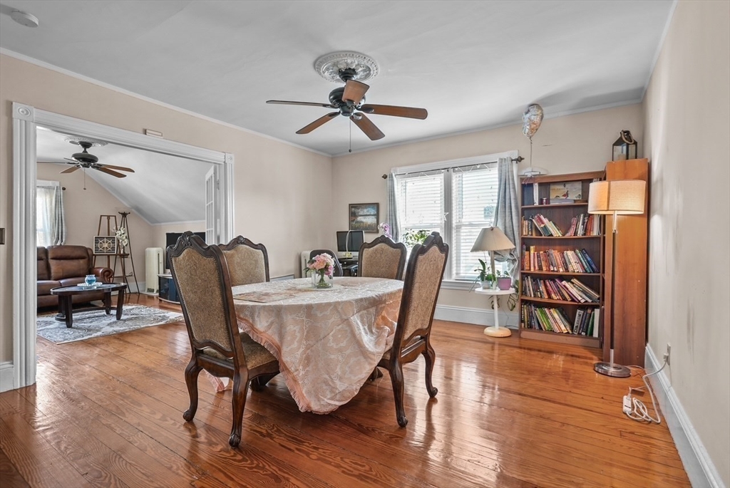42 Pleasant Street, Unit C North Attleboro, MA 02760 - Photo 8 of 16 a view of a a dining room with furniture window and wooden floor