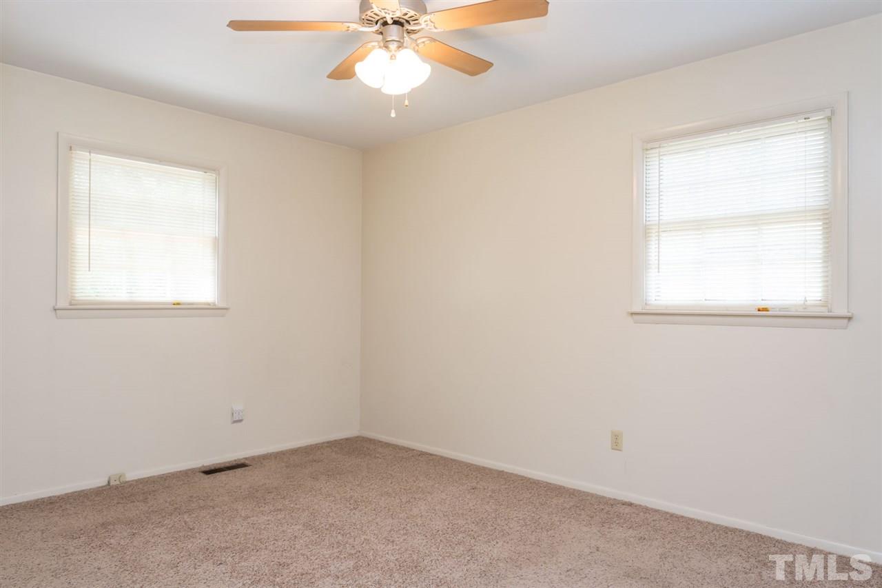 500 Pinecroft Drive Raleigh, NC 27609 - Photo 12 of 21 an empty room with a window
