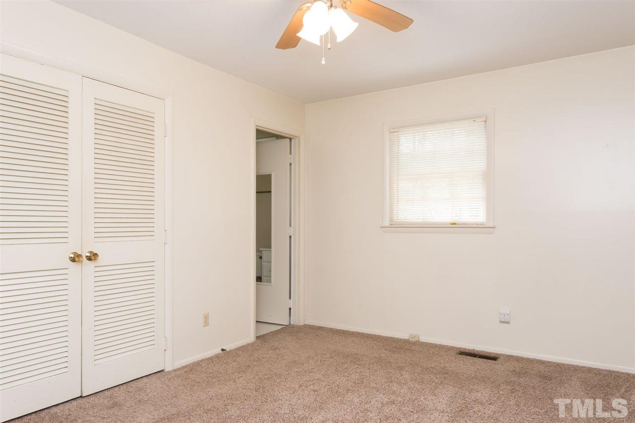500 Pinecroft Drive Raleigh, NC 27609 - Photo 13 of 21 an empty room with a window