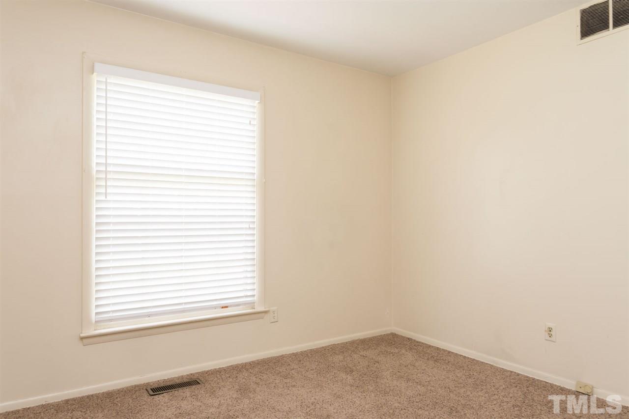500 Pinecroft Drive Raleigh, NC 27609 - Photo 16 of 21 an empty room with a window