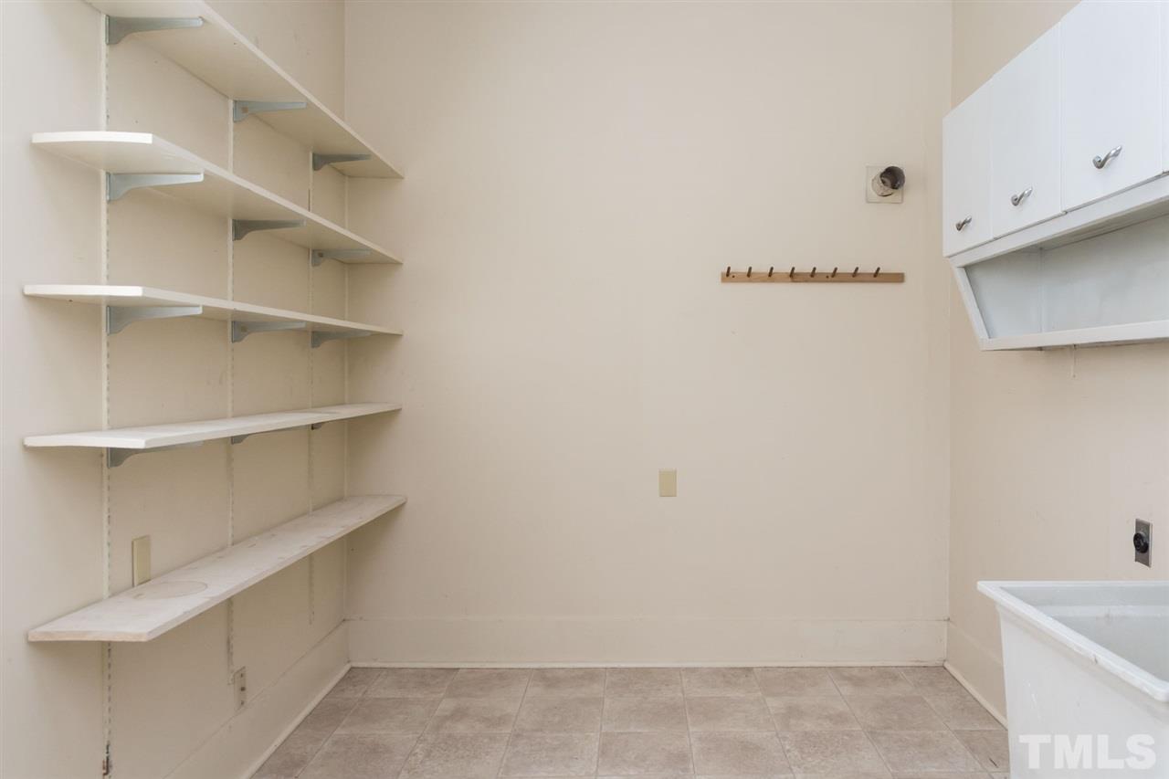 500 Pinecroft Drive Raleigh, NC 27609 - Photo 17 of 21 a view of an empty walk in closet