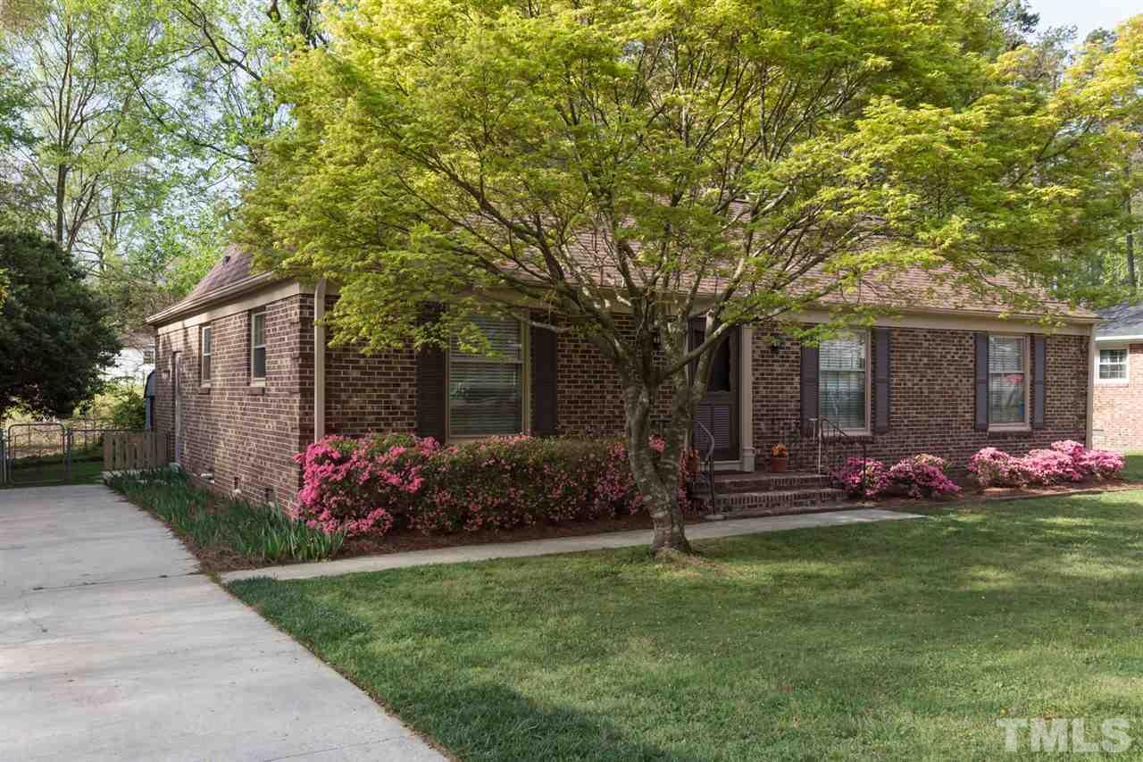 500 Pinecroft Drive Raleigh, NC 27609 - Photo 3 of 21 a front view of a house with garden