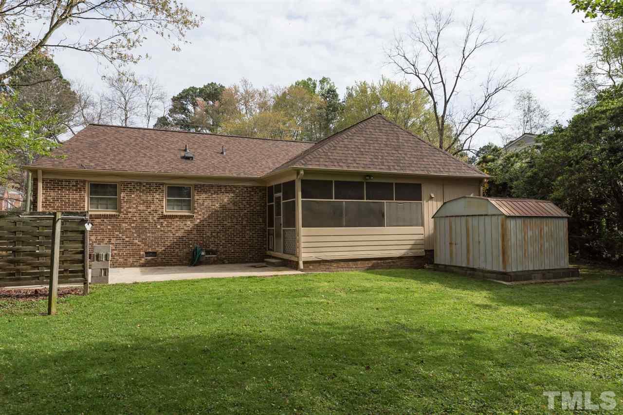 500 Pinecroft Drive Raleigh, NC 27609 - Photo 21 of 21 a front view of a house with a garden and yard