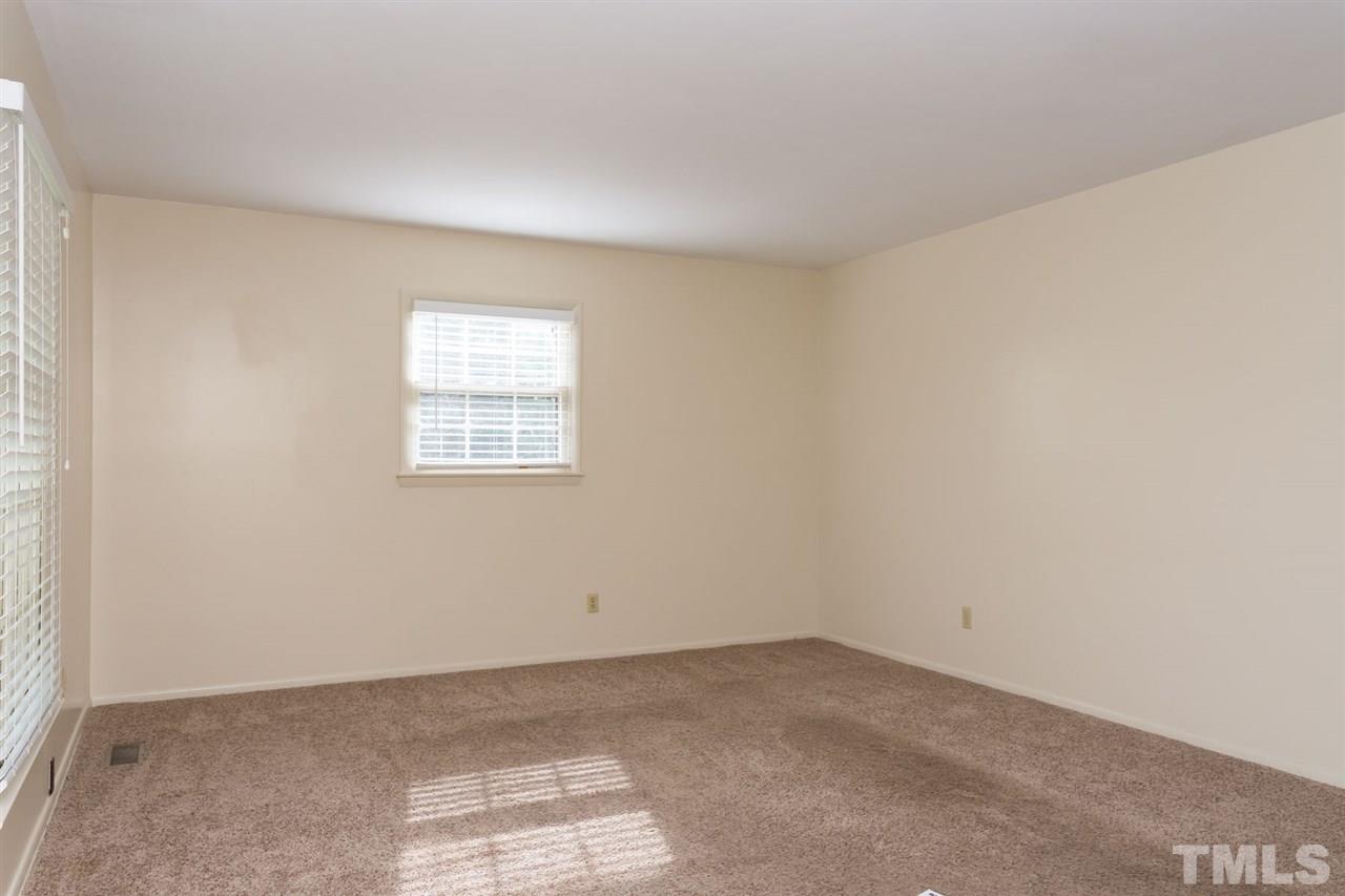 500 Pinecroft Drive Raleigh, NC 27609 - Photo 4 of 21 an empty room with windows
