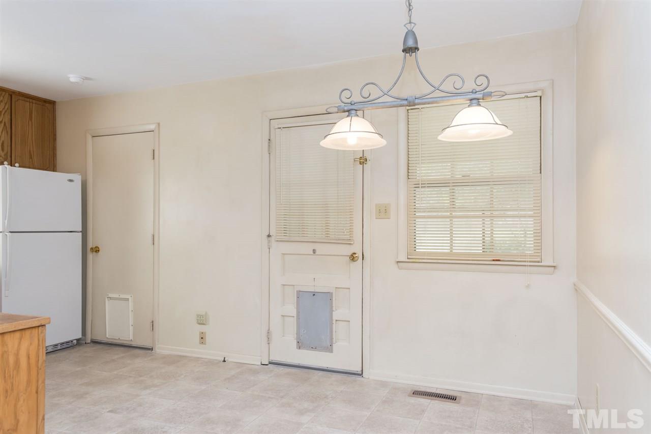 500 Pinecroft Drive Raleigh, NC 27609 - Photo 7 of 21 a view of a decorative light in a room