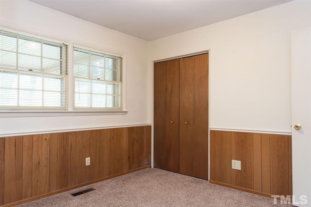 500 Pinecroft Drive Raleigh, NC 27609 - Photo 10 of 21 a view of an empty room with a window