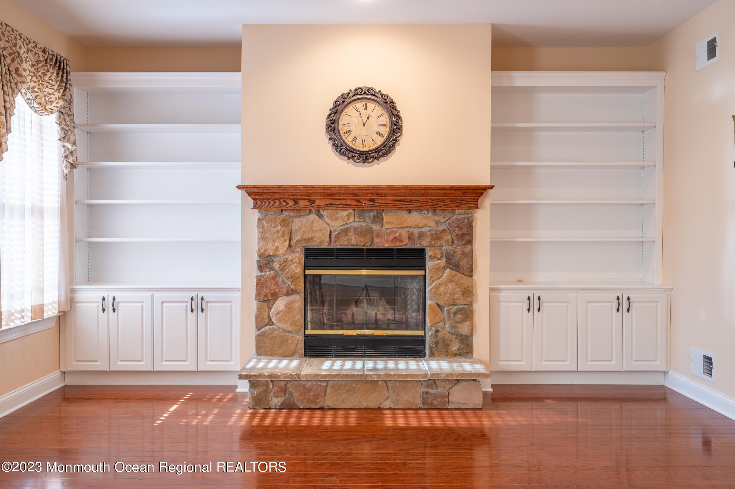 2 Springdale Road Manchester Township, NJ 08759 - Photo 12 of 37 a view of a livingroom with an empty space and a fireplace