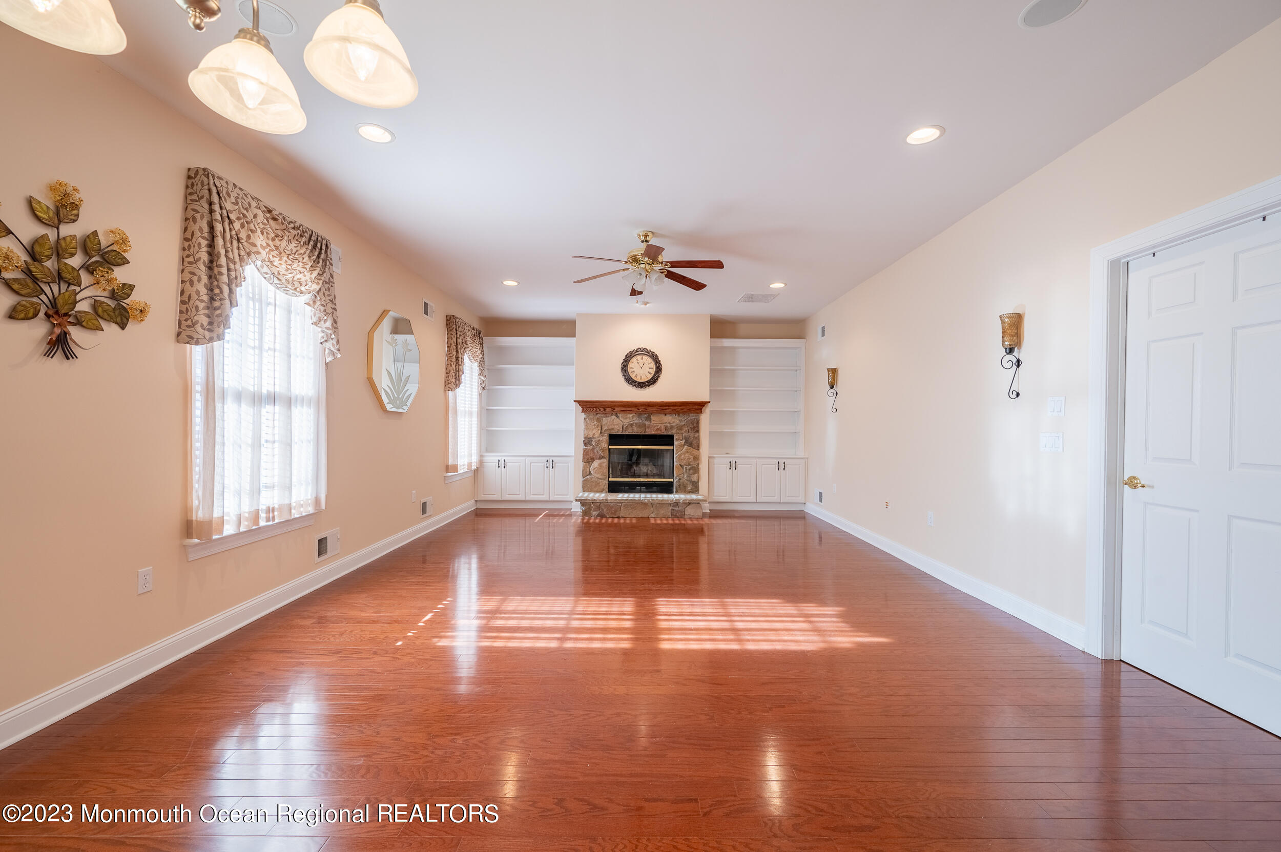 2 Springdale Road Manchester Township, NJ 08759 - Photo 16 of 37 a view of an empty room with wooden floor and a window
