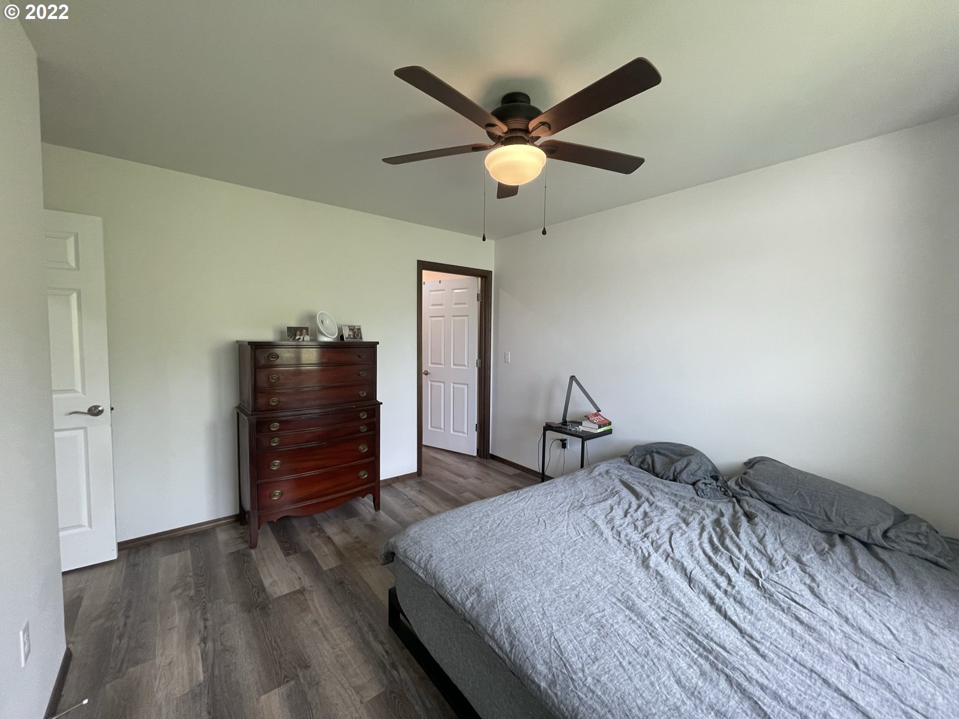 1235 Southwest 12th Street Pendleton, OR 97801 - Photo 16 of 17 a bedroom with a bed and cabinets