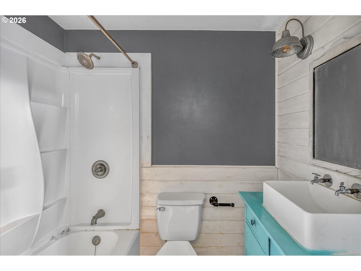 33320 Southeast Francis Street Gresham, OR 97080 - Photo 17 of 40 a bathroom with a sink and mirror