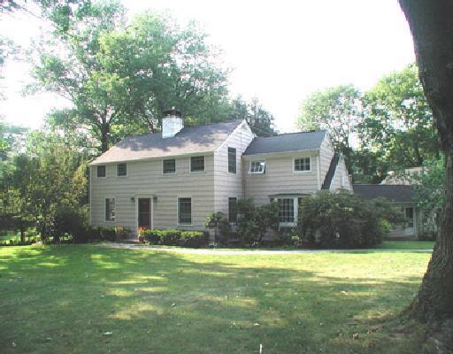 3 Bittersweet Trail Norwalk, CT 06853 - Photo 1 of 1 a front view of house with yard and green space