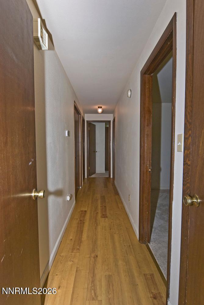 3185 Corey Drive Reno, NV 89509 - Photo 16 of 46 036-019-Hallway to Bedrooms-670x1000