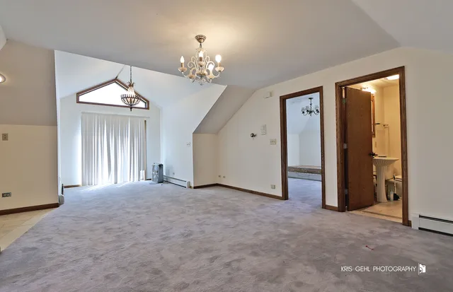 a bathroom with a tub sink and toilet
