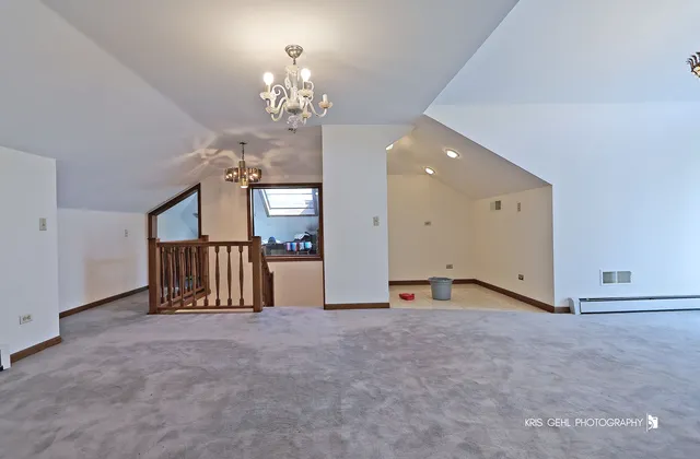 an entryway with wooden floor