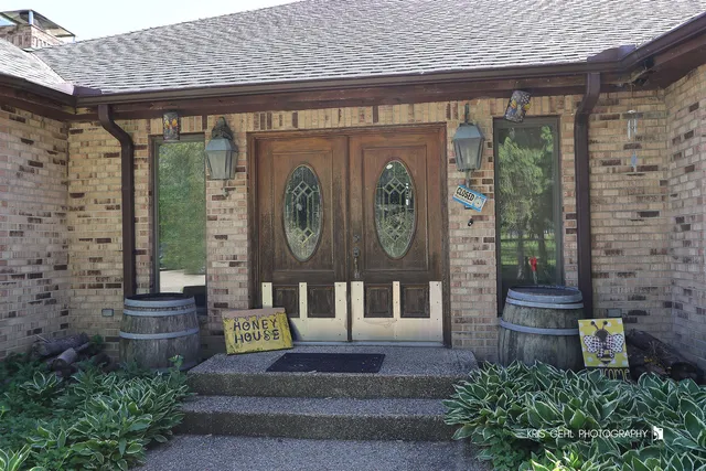 a front view of a building with garden