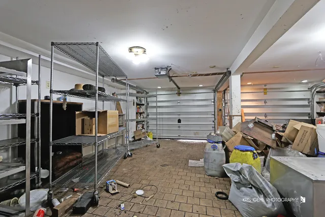 a living room with dining table and chairs