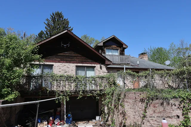 a view of a backyard with a garden