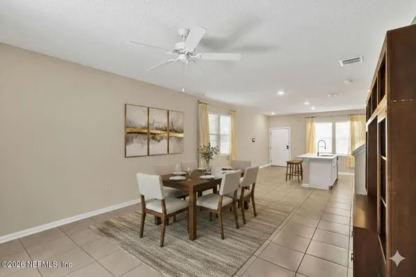 a view of a dining room with furniture