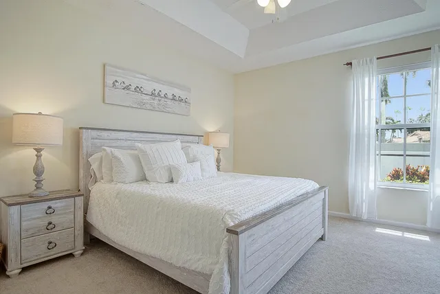 a bedroom with a bed and a cabinets