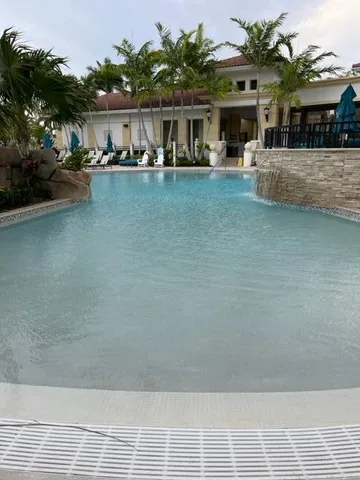 a front view of house with yard and seating