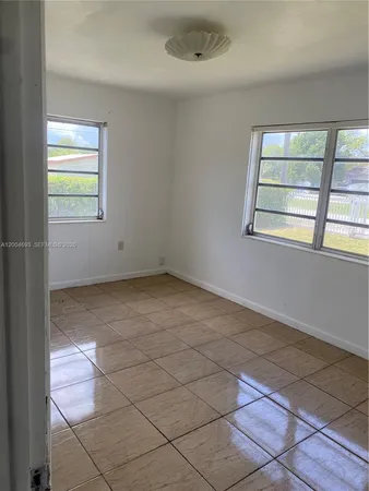 a view of a room with rack on the wall